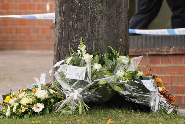 Flowers laid by Labour Party leader Keir Starmer, Prime Minister Boris Johnson, Speaker of the House Sir Lindsay Hoyle and Home Secretary Priti Patel at the scene near Belfairs Methodist Church in Eastwood Road North, Leigh-on-Sea, Essex, where Conservative MP Sir David Amess died after he was stabbed several times at a constituency surgery on Friday.