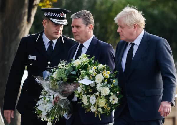 Chief Constable Ben-Julian Harrington, Labour Party leader Sir Keir Starmer and Prime Minister Boris Johnson arrive at the scene near Belfairs Methodist Church in Eastwood Road North, Leigh-on-Sea, Essex, where Conservative MP Sir David Amess died after he was stabbed several times at a constituency surgery on Friday.