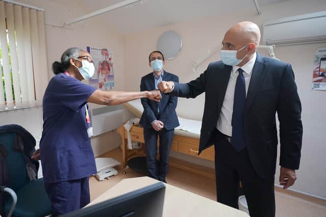 Health Secretary Sajid Javid meeting Dr Clementine Olenga-Disashi (left) and Dr Ali al-Bassam, during a visit to the Vale Medical Centre in Forest Hill, south east London, following the announcement of the blueprint for improving access to GP appointments and supporting GPs and their teams.
