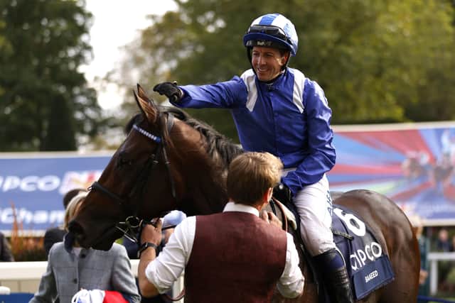Jockey Jim Crowley celebrates with Baaeed after winning the Queen Elizabeth II Stakes (Sponsored by Qipco) during the Qipco British Champions Day at Ascot Racecourse