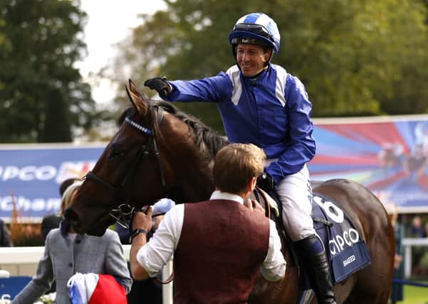 Jockey Jim Crowley celebrates with Baaeed after winning the Queen Elizabeth II Stakes (Sponsored by Qipco) during the Qipco British Champions Day at Ascot Racecourse