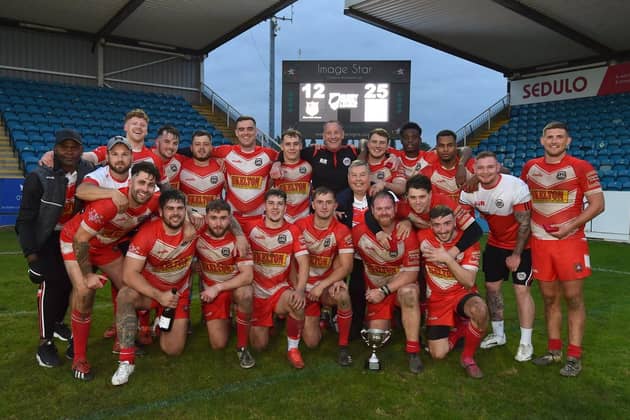 East Leeds celebrate their 25-12 victory over Clock Face Miners in the National Conference Cup final. Picture: Matthew Merrick.