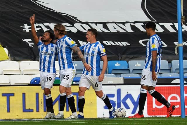 Huddersfield's Duane Holmes celebrates making it 2-0. Picture: Jonathan Gawthorpe