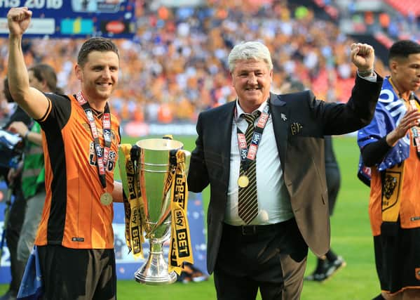 Then Hull City manager Steve Bruce (right) and his son Alex Bruce celebrate after the Championship Play-Off Final at Wembley Stadium in 2016. Picture: PA