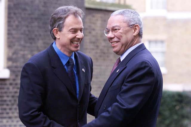 File photo dated 11/12/01 of the then Prime Minister Tony Blair (left) greeting US Secretary of State Colin Powell outside 10 Downing Street in central London, ahead of a ceremony to mark three months since the September 11 terrorist attacks in New York and Washington DC. Colin Powell, the former US Joint Chiefs chairman and US secretary of state, has died from Covid-19 complications, his family has said.