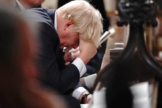 Prime Minister Boris Johnson (centre) attends a service to honour Sir David Amess at the Church of St Margaret, in the grounds of Westminster Abbey, London.