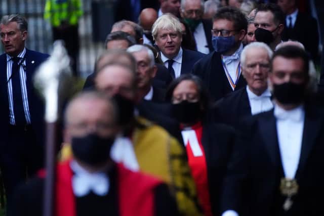 Prime Minister Boris Johnson, along with MPs and peers, arrives at The Church of St Margaret, in the grounds of Westminster Abbey, London, to attend a service to honour Sir David Amess.