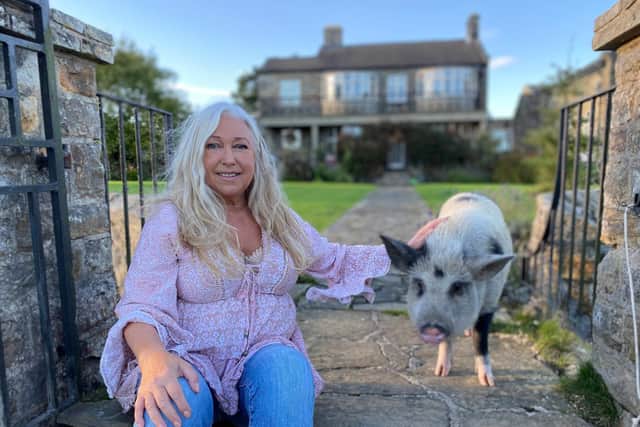 Joy Scott with her pet pig Pigley Scott