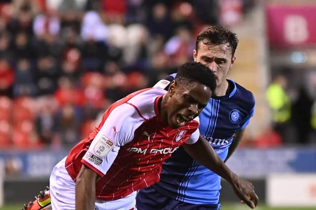 Chiedozie Ogbene falls under pressure from Josh Scowen as 
Rotherham United drew with Wycombe Wanderers. (Picture: Bruce Rollinson)