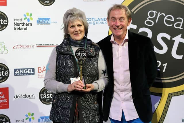 Judy Bell with Nigel Barden receiving her Lifetime Achievement award Picture: Phil Taylor