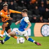 Hull City's Mallik Wilks has a shot on goal. Pictures: PA.