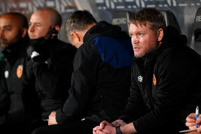 Hull City head coach Grant McCann under pressure after defeat to Peterborough.
