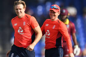Back in the fold: David Willey with captain Eoin Morgan. Picture: Getty Images