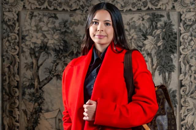 Iona wears: circa 1990s Vivienne Westwood Red Label Wool Three Quarter Length Coat, estimate: £150-£250; from the Collection of a Gentleman, circa 1998 Louis Vuitton Montsouris Louis Monogrammed Rucksack