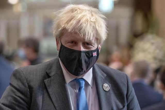 Prime Minister Boris Johnson attends a service to mark the centenary of Northern Ireland at St Patrick's Cathedral in Armagh. but should face masks be mandatory at all inside settings?