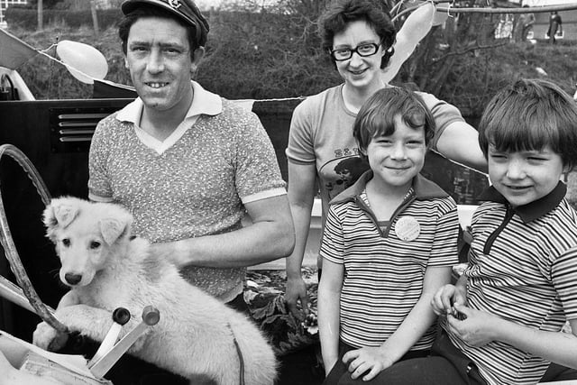 The Ratcliffe family and dog Lassie, from Scot Lane, Newtown, on their cruiser enjoying the Appley Bridge Boat Rally on Saturday 5th of April 1980.
The boat rally was a popular event for many years and organised by the Douglas Valley Cruising Club over the Easter weekend.