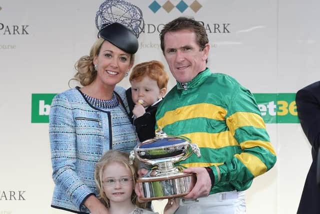 Sir AP McCoy, pictured with his family, became the 20-times champion jockey.