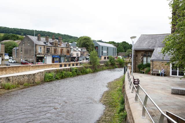 New flood defences for Mytholmroyd have finally been completed.