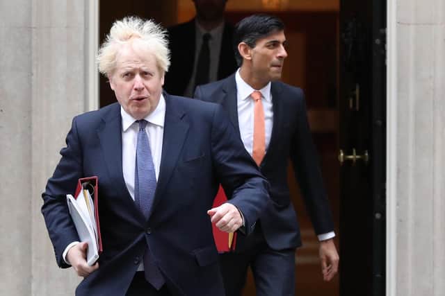 Boris Johnson and Rishi Sunak stand accused of setting a poor exmaple on the wearing of face masks.