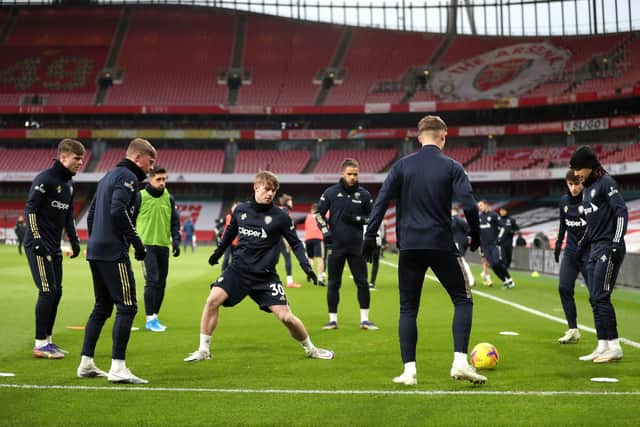 Leeds United's Joe Gelhardt and his team-mates warm-up ahead of a Premier League clash at Arsenal back in February. Picture: Catherine Ivill/PA