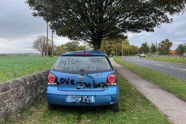 A blue Volkswagen Polo has been decorated in memory of three teenagers who died in a car crash in Kiveton Park, Rotherham, near Sheffield on Sunday evening.