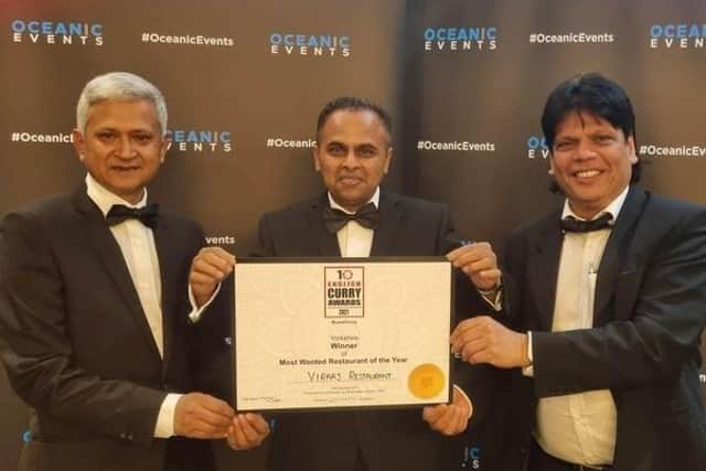 Abdul Rouf, Head Chef at Viraaj, Sufi Miah, manager at Viraaj, and Assistant Manager Ahmed Hussain pictured with their award