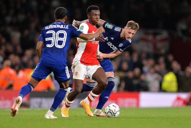 Familiar face: Eddie Nketiah of Arsenal proved to be a handful for Liam Cooper and Leeds United in the Carabao Cup last night. It was from a mistake by Cooper that Nketiah capitalised to score the Gunners’ second and put the tie beyond the Whites’ reach.(Pictures: Bruce Rollinson)