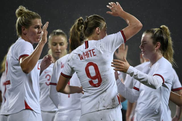 England's Ellen White, centre, celebrates a goal with teammates during the 2023 Women's World Cup Qualifying match between Latvia and England (AP Photo/Roman Koksarov)
