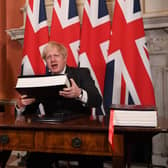 This was Boris Johnson signing his Brexit deal with the EU.