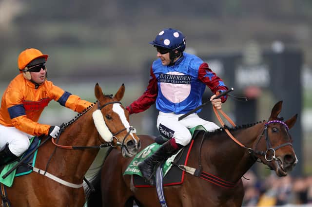 Aidan Coleman shakes the hand of the defeated Joe Colliver after Paisley Park beat Sam Spinner in the 2019 Stayers' Hurdle at the Cheltenham Festival.