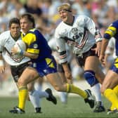 1 Sep 1991: Bobby Goulding (second left) of Leeds gets away from the Widnes defence during a Stones Bitter Championship match at Naughton Park in Widnes, England. \ Mandatory Credit: Chris Cole/Allsport
