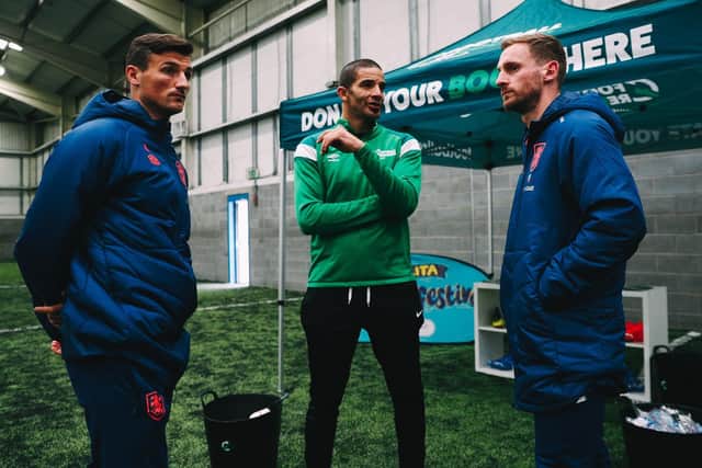 Town defenders Matty Pearson, left, Tom lees, right, with David James  at the Utilita Football Festival hosted by Huddersfield Town Foundation (Picture: Huddersfield Town Foundation)