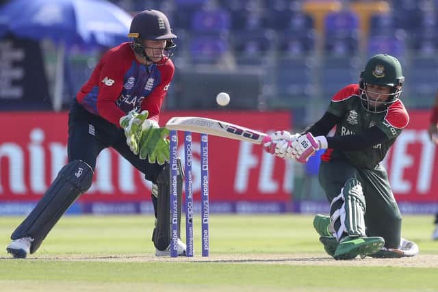 Bangladesh's Mushfiqur Rahim, right, bats during the Cricket Twenty20 World Cup match between England and Bangladesh in Abu Dhabi (AP Photo/Aijaz Rahi)