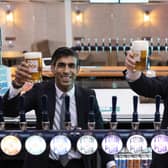 Boris Johnson and Rishi Sunak visit a brewery to promote the Budget's changes to alcohol duty.