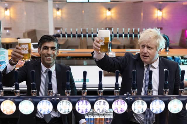 Boris Johnson and Rishi Sunak visit a brewery to promote the Budget's changes to alcohol duty.
