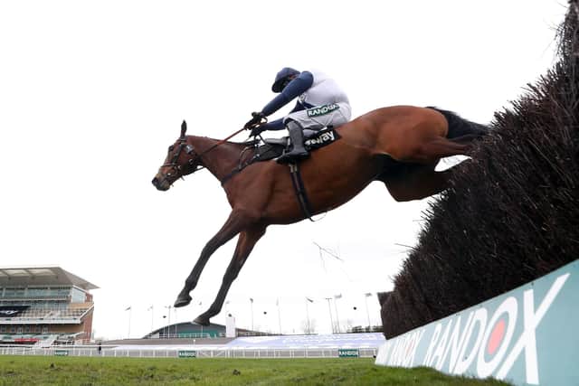 This was Clondaw Castle and Jonathan Burke clearing a fence in the betway Bowl at Aintree where they finished second to Clan Des Obeaux.