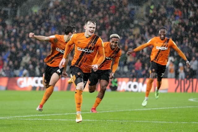 WINNING STYLE: Hull City's Keane Lewis-Potter (centre) celebrates his goal during the recent Championship match with Middlesbrough Picture: Richard Sellers/PA