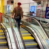 Undated handout photo issued by Network Rail of a passenger using an escalator at Birmingham New Street station
