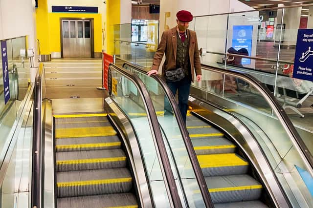 Undated handout photo issued by Network Rail of a passenger using an escalator at Birmingham New Street station