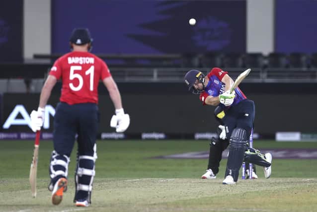 POWER FULL: England's Jos Buttler hits a six against Australia in Dubai on Saturday. Picture: AP/Aijaz Rahi