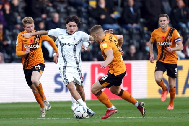 Hull City's Andy Cannon, Coventry City's Callum O'Hare and Hull City's Daniel Batty (left-right) in action at the MKM Stadium Picture: Richard Sellers/PA