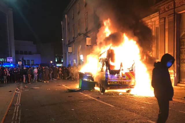 Roberts set fire to a police van during the rioting