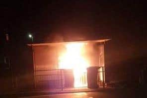 The bins were taken to the bus stop before being set on fire