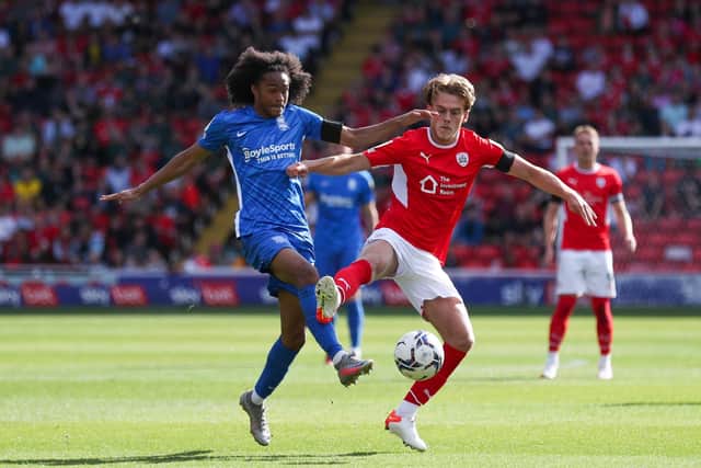 Better times ahead? Barnsley's Josh Benson, right. Picture: Isaac Parkin/PA Wire.