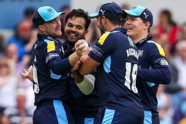 Yorkshire's Azeem Rafiq (second left) is congratulated by Adam Lyth (L), Gary Ballance (R) and Tim Bresnan (second right) on the wicket of Derbyshire's Chesney Hughes back in 2016 (Picture: Alex Whitehead/SWpix.com)
