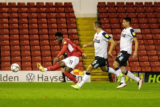 Aaron Leya Iseka scores the second goal for Barnsley. (Picture: Tony Johnson)