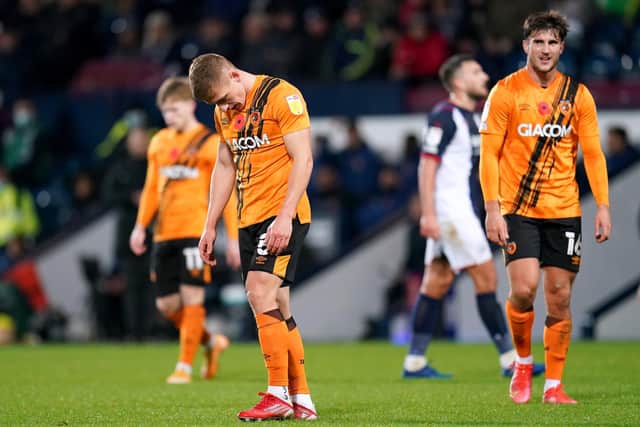 Hull City's Greg Docherty appears dejected after defeat to West Brom (Picture: PA)