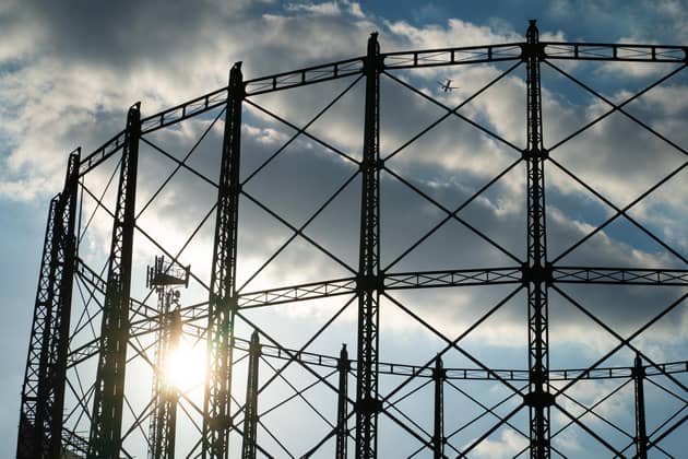 Library image of gas holder. Last month, CNG said that costs faced by gas suppliers have tripled since last year, so customers can expect higher bills this winter. Picture: PA