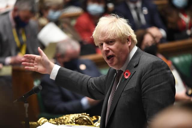 Boris Johnson backed Parliament's decision to halt a vote on the suspension of former minister Owen Paterson for breaking lobbying rules.