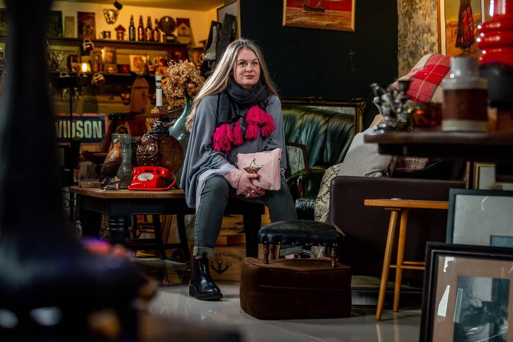 Robin Gifts owner Zoe Wotherspoon wears grey trousers, £24.50; poncho, £17; scarf l, £9.50; star clutch, £12, all from Robin Gifts at 53 Bo' Grove, Harrogate.